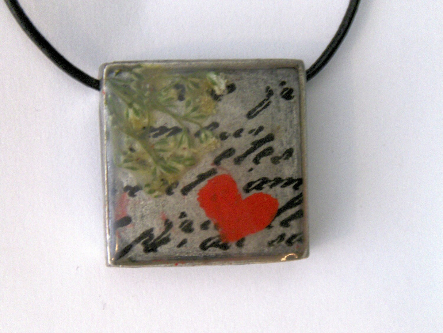 Wearable Art Square bezel Pendant with writing, babys breath, and heart