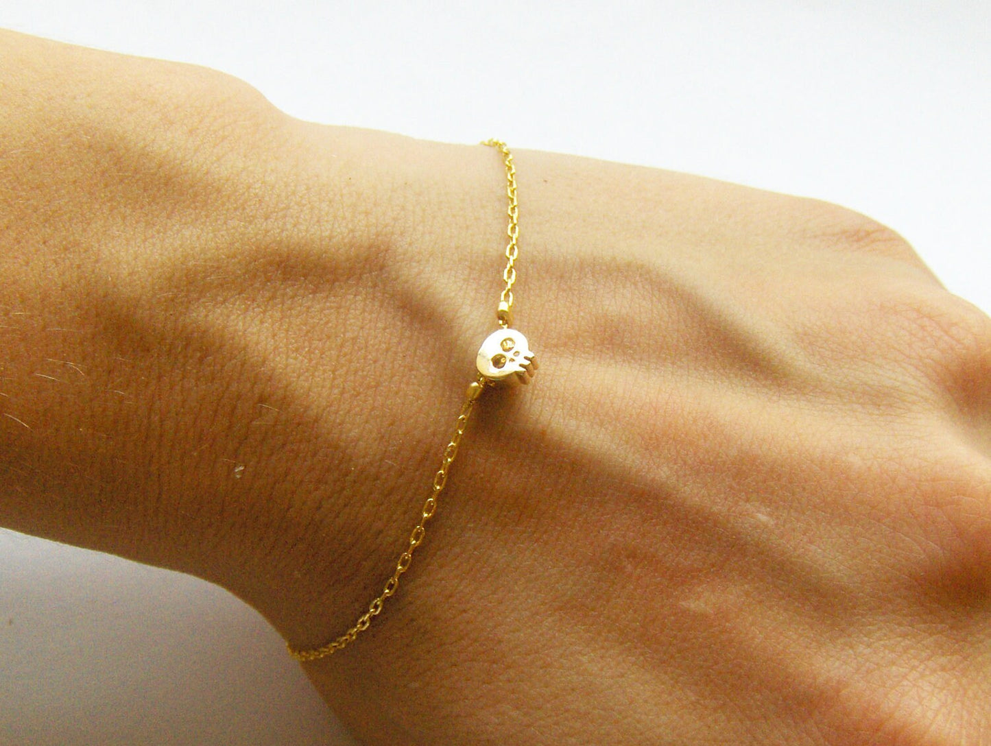 Mini Skull Bracelet in Gold - 16K gold plated chain and charm